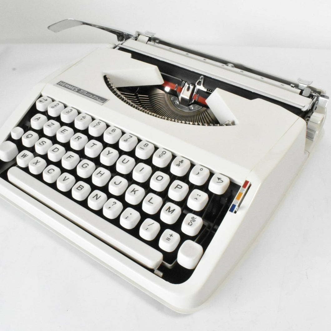 1973 Hermes Baby Typewriter - French and English keyboard AZERTY